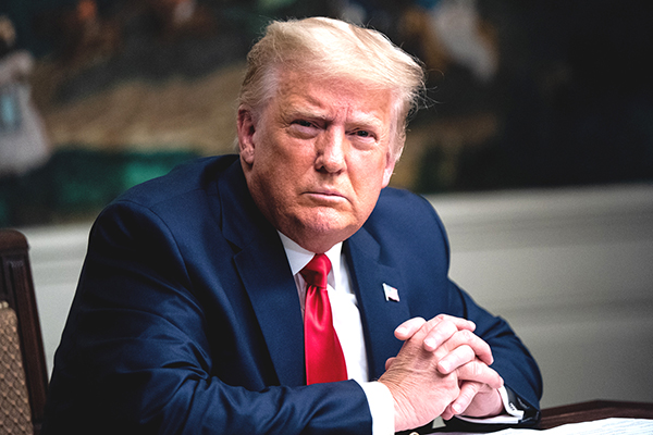 President Trump Participates In Thanksgiving Video Teleconference With Military Members